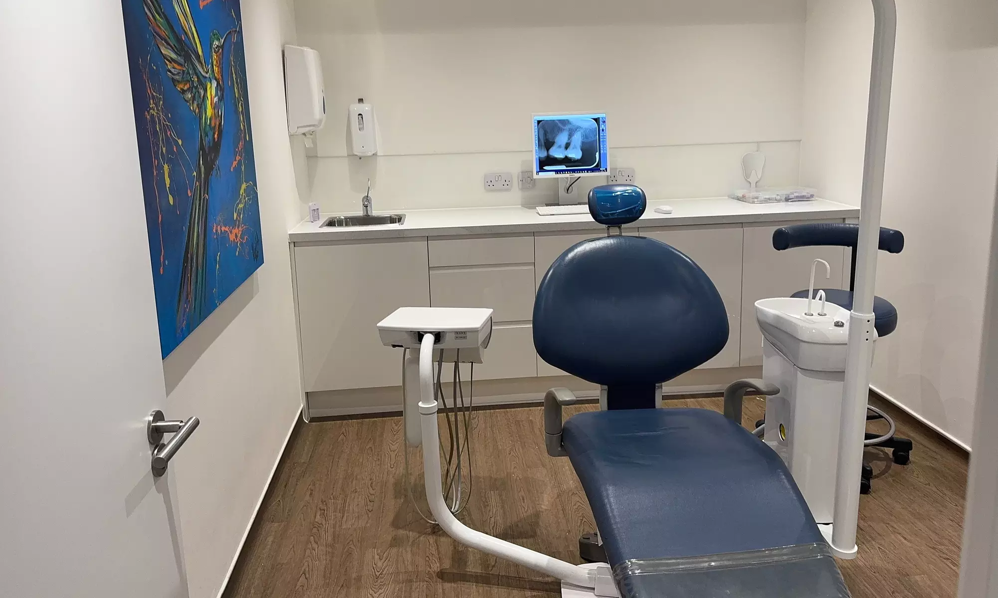 Teeth Whitening treatment with dental exam,air polish & home whitening