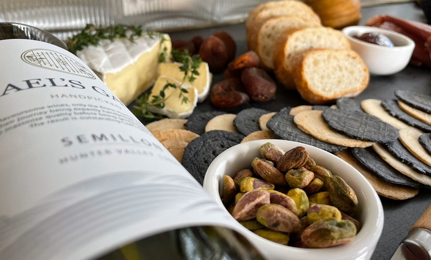 Image 2: Unforgettable Wine and Cheese Tasting with Optional Charcuterie Awaits