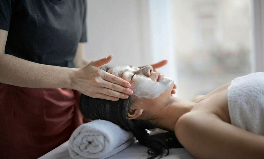 Image 2: Unwind w/ a 30- or 45-Min Body Scrub Massage w/ 30-Min Express Facial