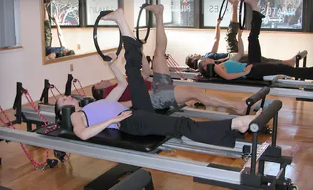 Three IM=X Pilates Reformer Classes with DVD or Two Private IM=X Pilates Sessions at IM=X Pilates Studio NY (Up to 74% Off) - Primary Image