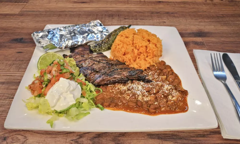 Food and Drink Credit Worth $40 or $80 at a Lively Poker Venue 