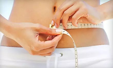 One or Four Herbal Weight-Loss Spa Wraps at Quickfit Fitness Studio in Boulder (Up to 67% Off) - Primary Image