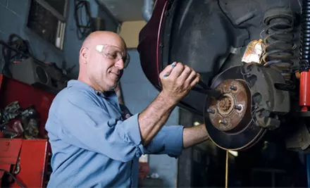 $35 for an Oil Change, Tire Rotation, Engine Light Scan, and Brake Inspection at Running Automotive in Marysville ($130 Value) - Primary Image