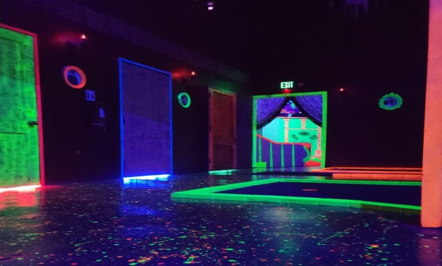 Image 3: Light Up the Fun with Blacklight Minigolf Rounds and Arcade Games!