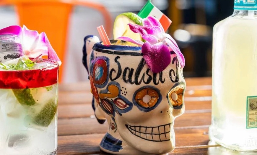 Image 9: Vibrant Rooftop Dining: Choose Meals, Margaritas, or Dining Credit