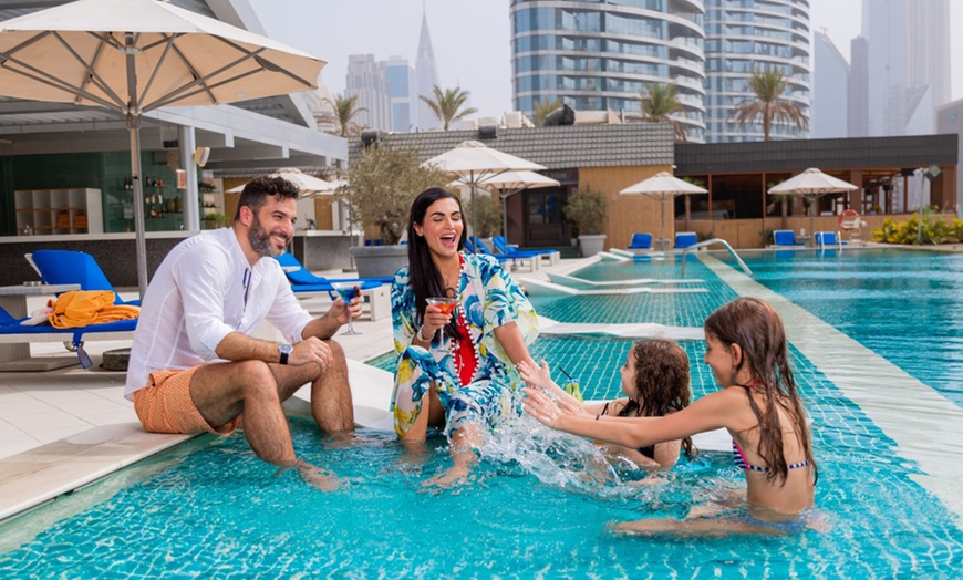 Image 1: Pool Access with Food Credit at 5* Sofitel Dubai Downtown