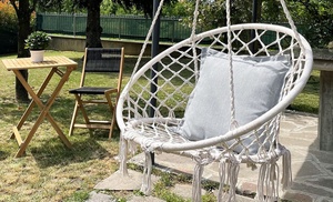 Hangende macramé touwstoel met franjes Hangende macramé touwstoel met franjes