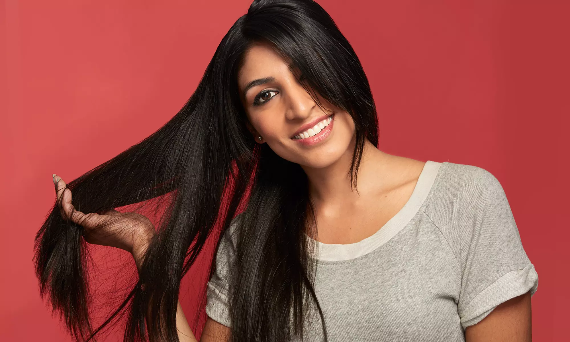 Brazilian Blowout with Optional Haircut or Haircut with Color at The Glam Box - Paula Madrid (Up to 65% Off) - Primary Image