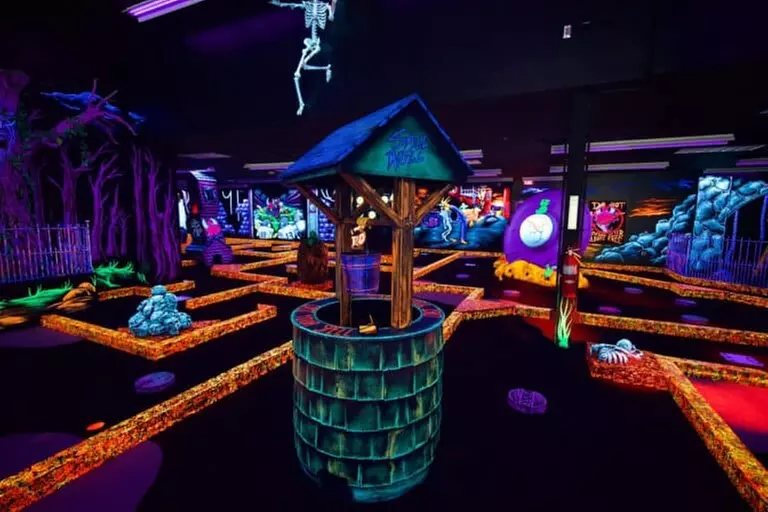 Enjoy 18 Holes of Blacklight Mini Golf, Up to 38% Off