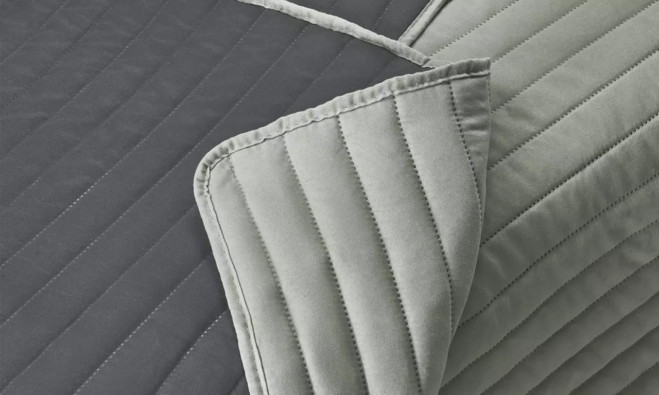 Housse de canapé matelassée bicolore