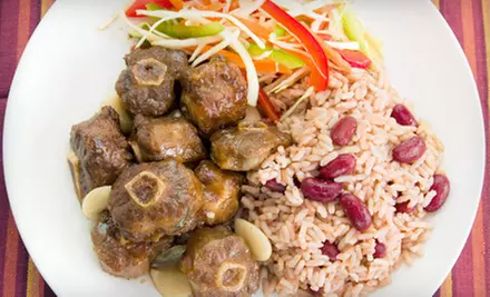 Caribbean Dinner with Entree, Side, and Dessert for Two, Four, or Six at Paulette’s Island Place (Up to 61% Off) - Primary Image