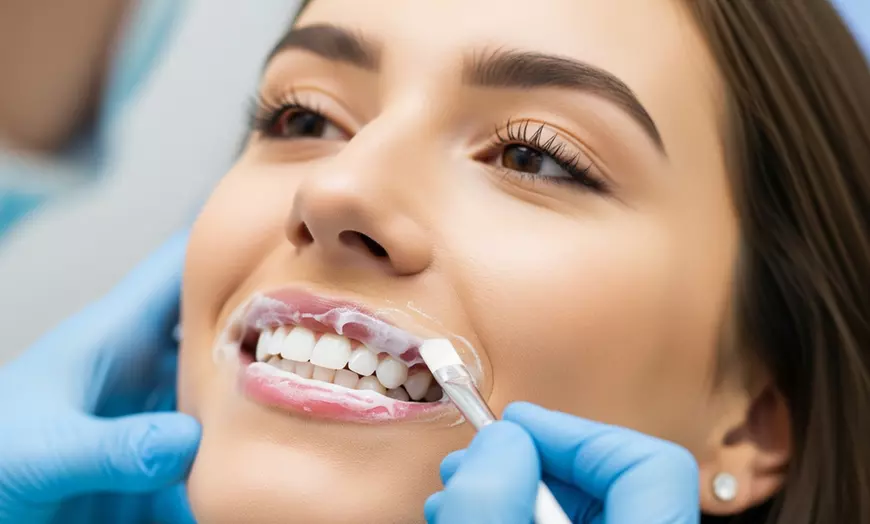 Image 1: Brighten Your Smile with 30- or 60-Minute Teeth Whitening Treatment