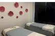 Single or Couples 45 or 60-Min Swedish/Deep Tissue Body Massage w/Free Hot Stone & Essential Oil (Up to 52% Off) - Second Medium