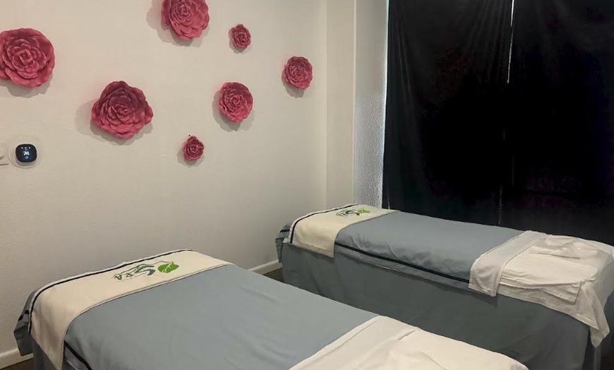 Image 2: Swedish or Deep Tissue Body Massage w/ Free Hot Stone & Essential Oil