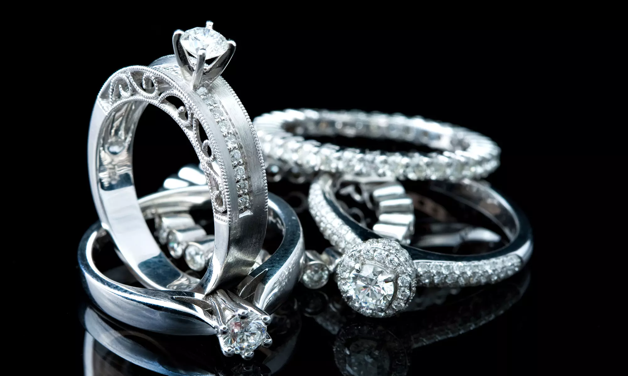 $100 Towards Jewelry or Three Jewelry Cleanings at The Diamond Gallery (Up to 92% Off) - Primary Image