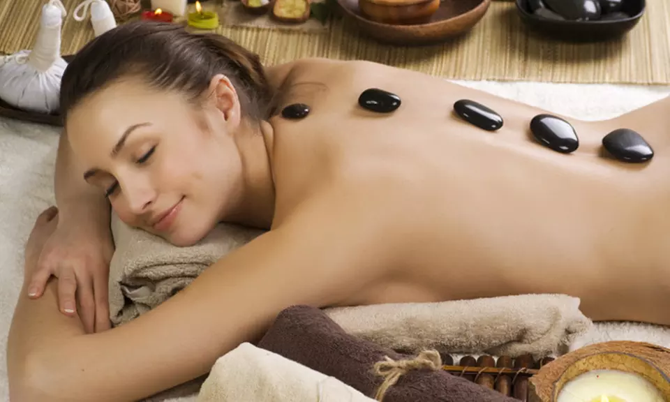 One 60 or 90-Minute Hot Stone Massage (Balinese) with Foot Spa for One Person or 60-Minute Foot Reflexology and Foot Spa - Primary Image