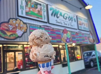 18 Holes of Mini-Golf and a Small Ice Cream with One Topping or a Small Slush for Two - Magoo's