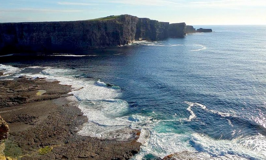 Image 1: Sunset Cruise Along The Cliffs 