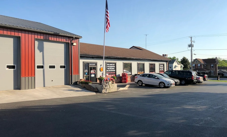 Image 1: Full Synthetic or Blend Oil Change with Tire Rotation at Meineke Auto