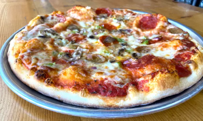 12-, 16-, or 18-Inch Specialty Pizza, or Food and Drink at Sexy Pizza (Up to 30% Off) - Second Medium