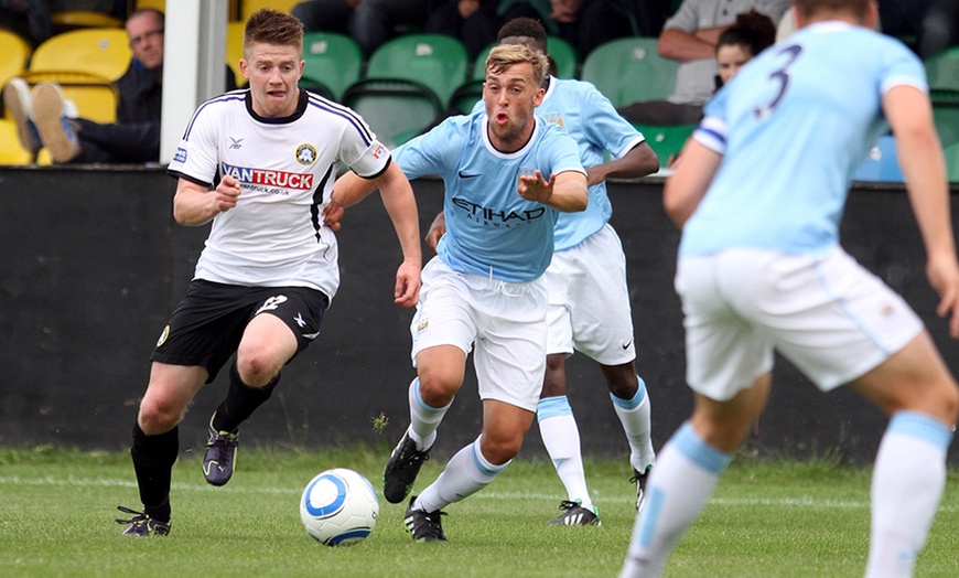 Image 4: Rhyl FC v Man City or Stoke