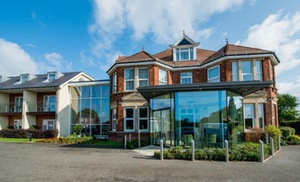 Surrey: 4* Deluxe Room Stay with Dinner and Afternoon Tea