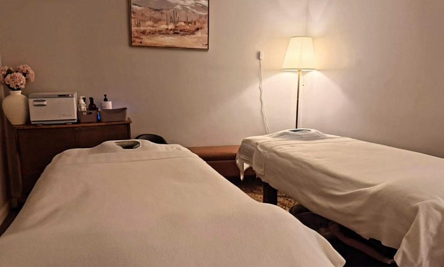 Image 2: Couples Massages w/Hot Towels, CBD Oil or Aromatherapy + Hot Stones