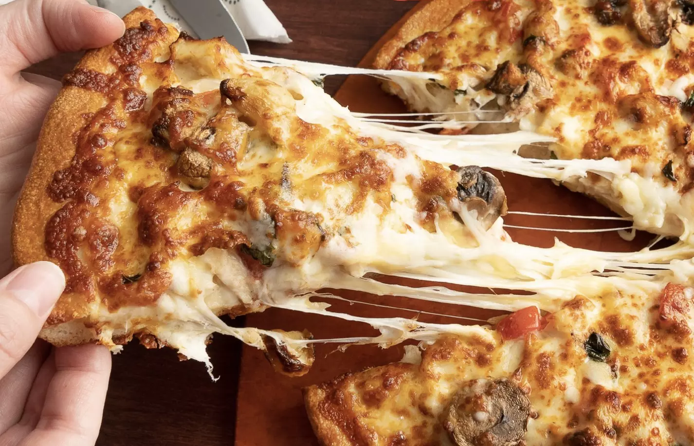 Sarpino's Specialty Pizza with Drinks & Breadsticks or $40 Voucher