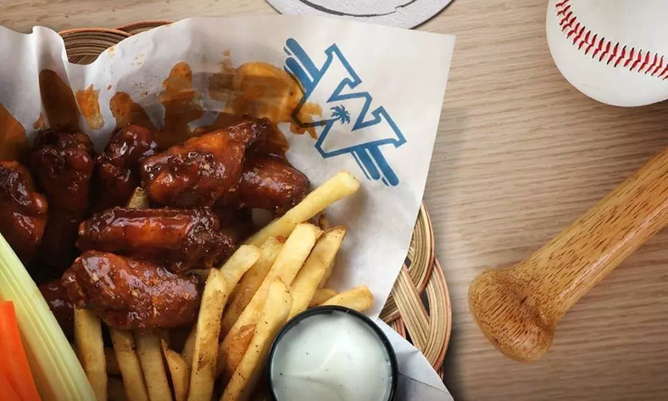 Wings Combo Packages or Family Weekend Special Package at Wild Wing (Up to 13% Off). Five Options Available. - Primary Image