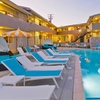 Image 1: Hotel in Coachella Valley with Mountain Views & Outdoor Pool Retreat