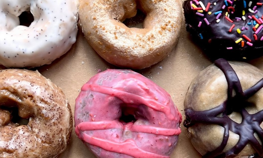 Image 16: Up to a Dozen Donuts, 4 Donuts & 2 Drinks or $50 to Spend