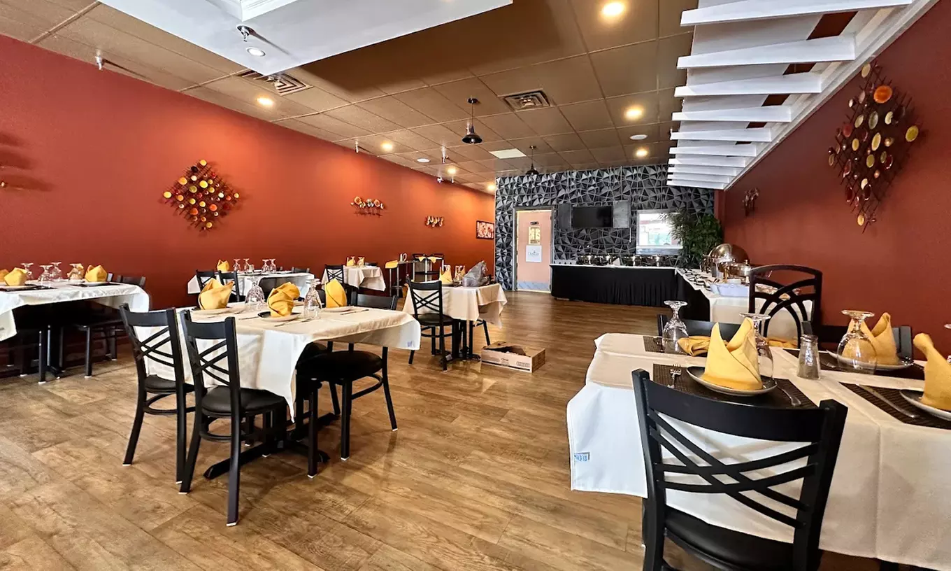 Authentic Indian Cuisine with Food Credit or Dinner for Two or Four