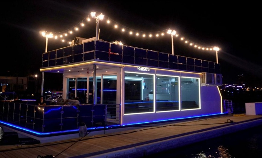 Image 1: Dubai Canal Dinner + soft drinks 4* Luxury Boat For Up to Four Adults