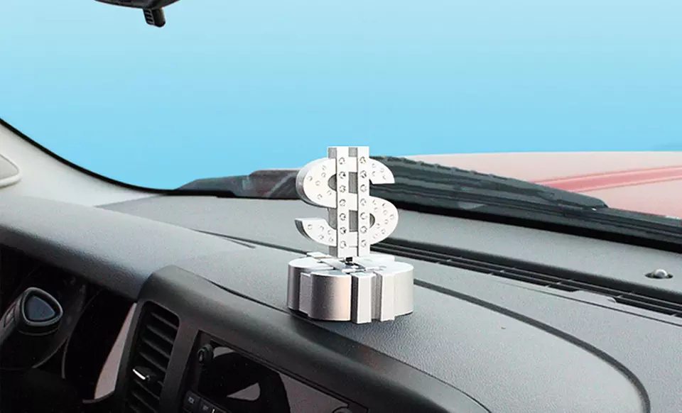 Solar Spinning Dollar Sign Dashboard Ornament - Primary Image