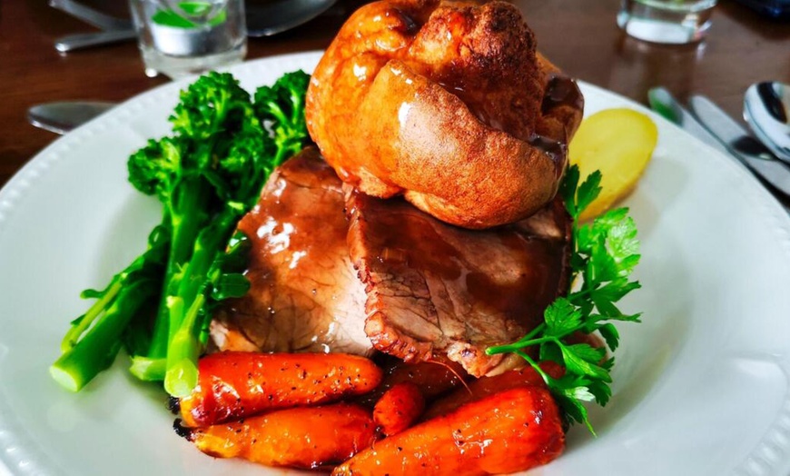 Image 1: One or Two-Course Sunday Roast for Two with Optional Glass of Wine
