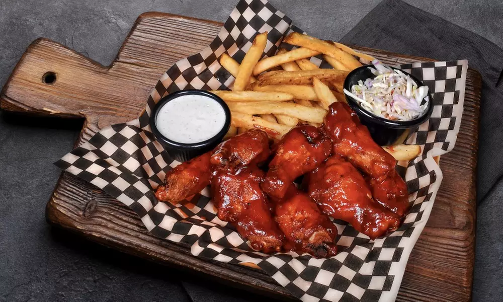 Food and Drink Credit Worth $40 or $80 at a Lively Poker Venue 