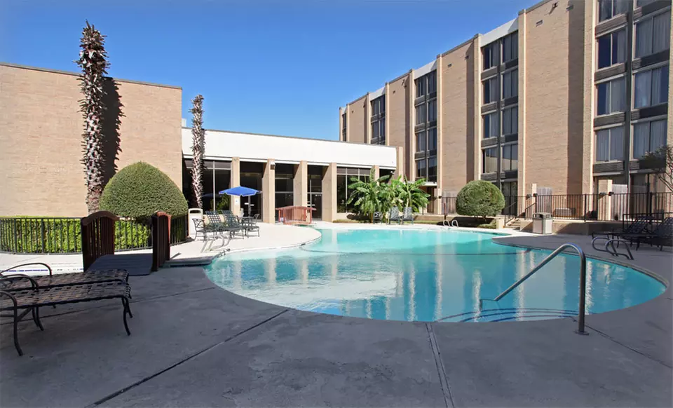 Stay with Optional Six Flags Tickets at Admiral Hotel in Arlington, TX. Dates Available into November. - Primary Image