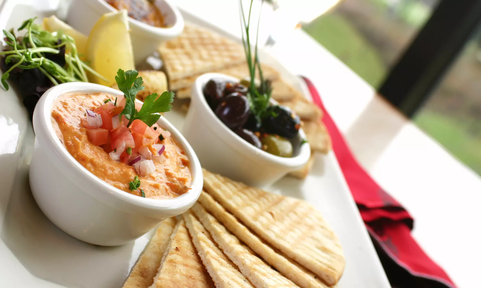 $5 Buys You a Coupon for 30% Off Orders of $30 or More at Hummus Cafe - Primary Image