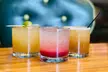 One entree or cocktail for each person and 90 or 60 minutes of golf simulator time for two or four - Second Medium