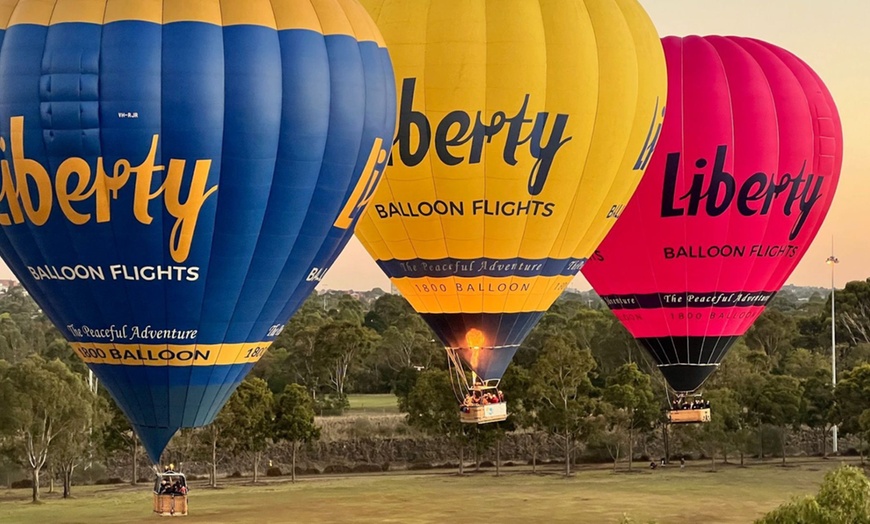 Image 2: Fly Over Yarra River & Melbourne's Iconic Landmarks During Sunrise
