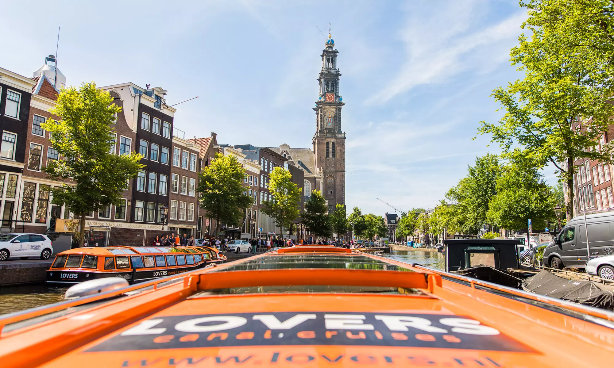 Erkunde tagsüber oder abends die ikonischen Grachten von Amsterdam