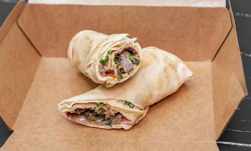 Image 6: Experience Authentic Middle Eastern Flavors with Unique Shawarma's!