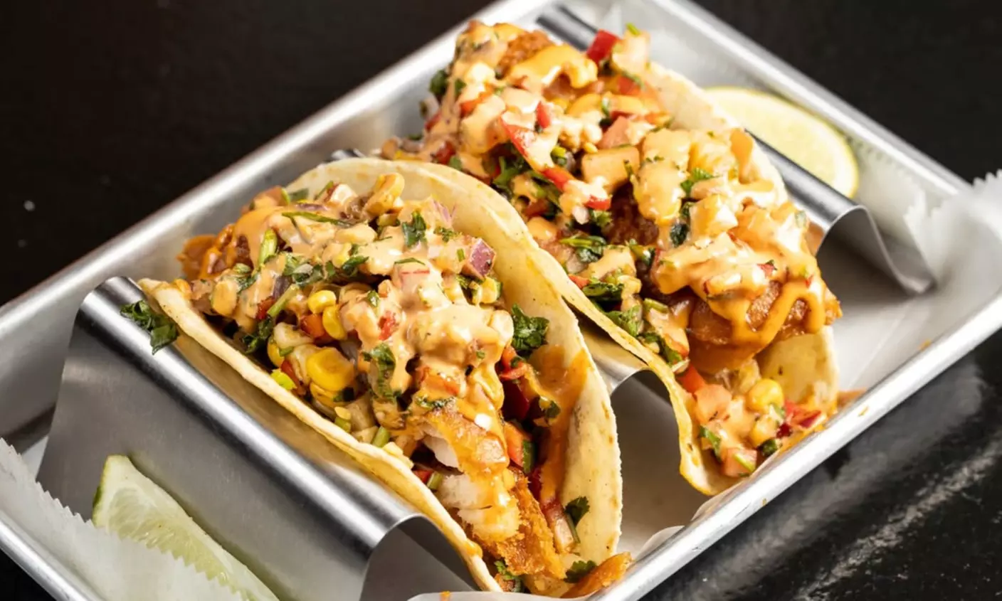 Vibrant Rooftop Dining: Choose Meals, Margaritas, or Dining Credit