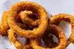 One, Two, or Four Traditional Cheesesteaks with a Large Fry, Drinks, and a Medium Ice Cream (Up to 34% Off) - Second Medium