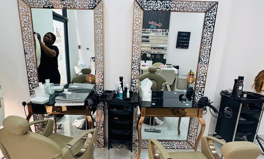 Image 4: Hair Wash & Blow-dry with Optional Haircut, Root Touchup, or Hot Oil