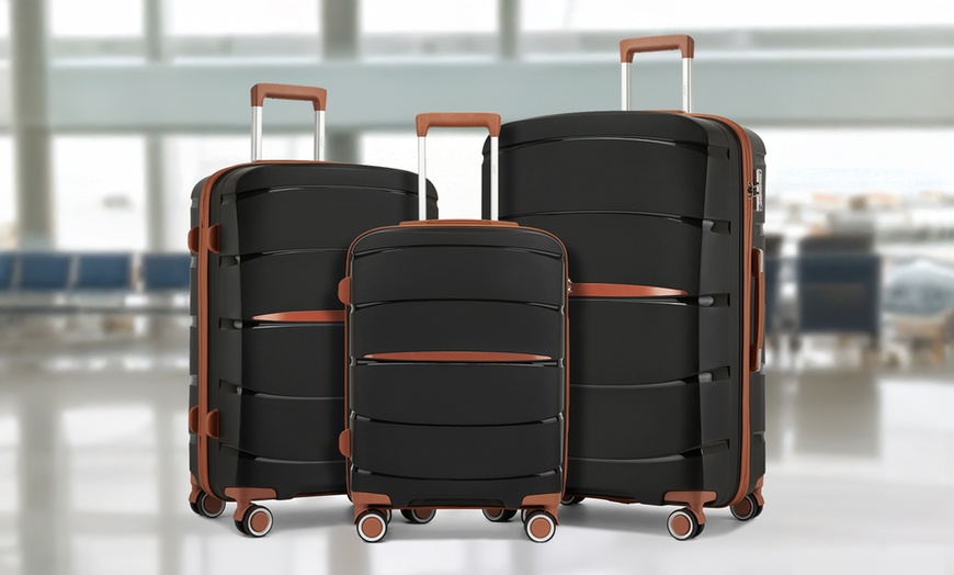 Image 2: 1 o 3 valigie in propilene con manico telescopico