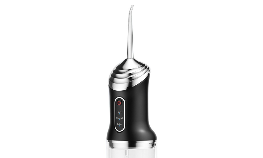 Image 9: Three Modes Electric Cordless Water Flosser for Teeth
