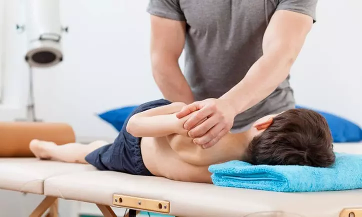 Chiropractic Exam with 1 or 2 Treatments or 1-Hour Massage