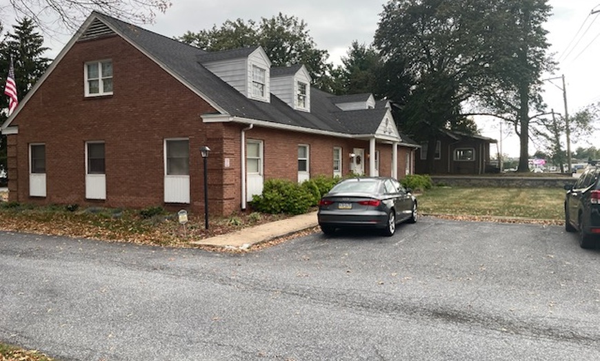 Image 5: 1, 3 or 5 30-Min Therapeutic Massages with Hot Stones or Aromatherapy