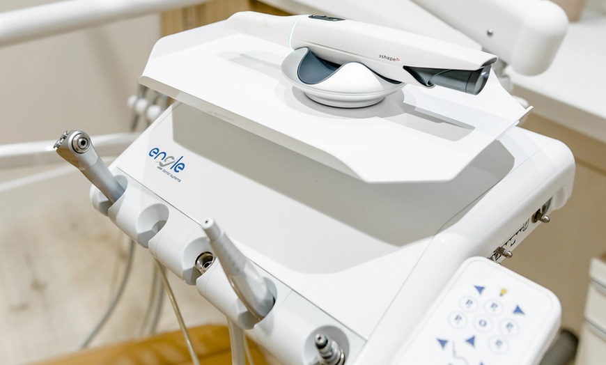 Image 6: Complete Dental Exam with Cleaning with Choice of Varnish and X-Rays